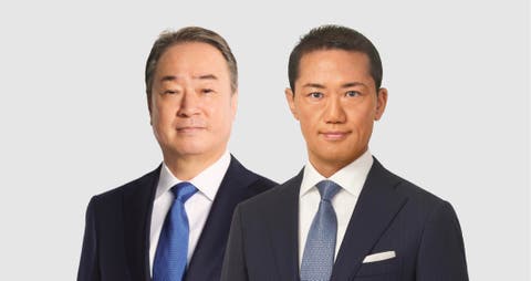 White dentsu logo on a black background
